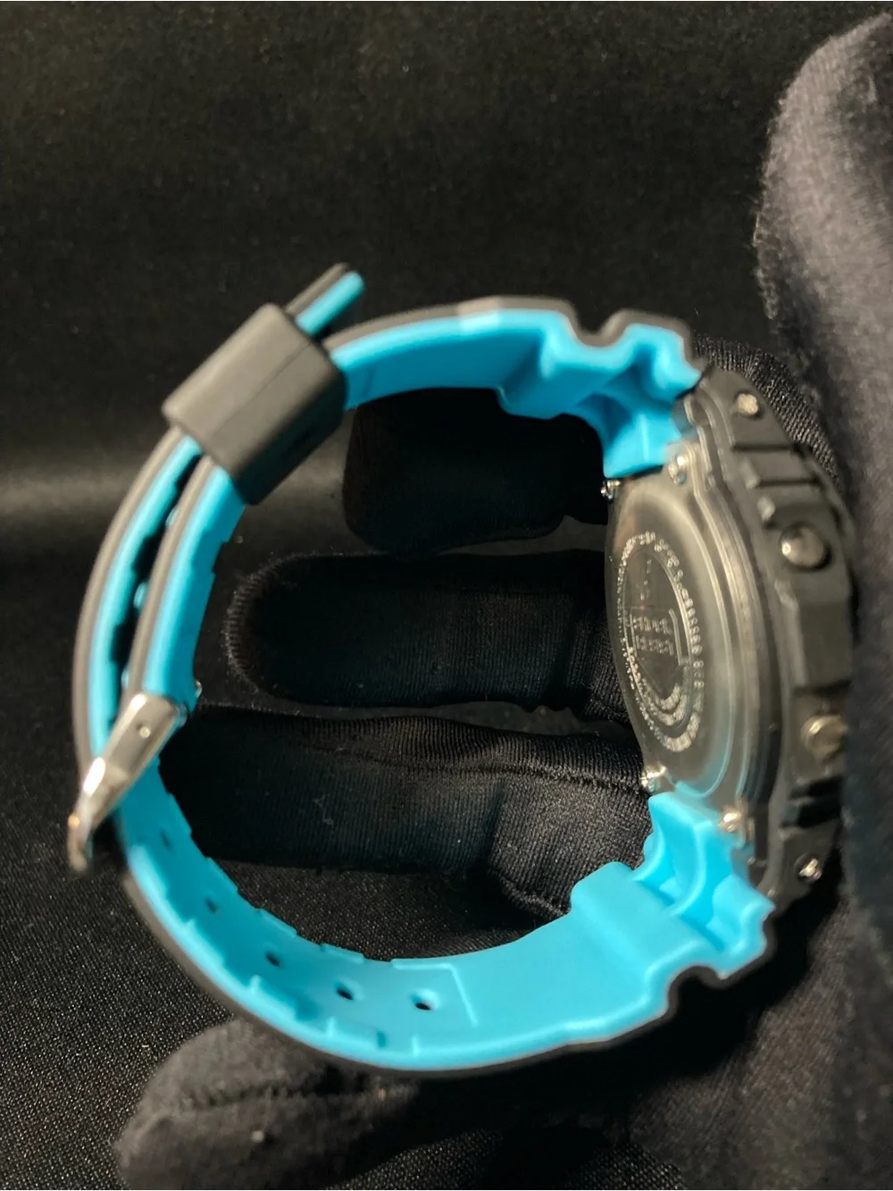 Teal and Black G Shock Dw5600